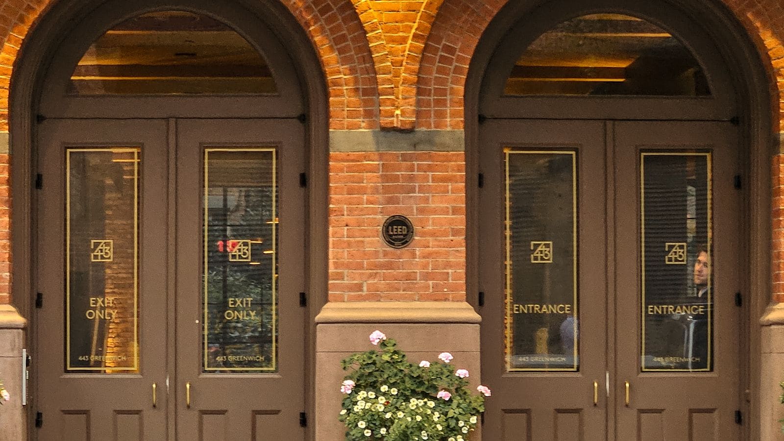 Arched stone doorway of a classic Upper East Side building